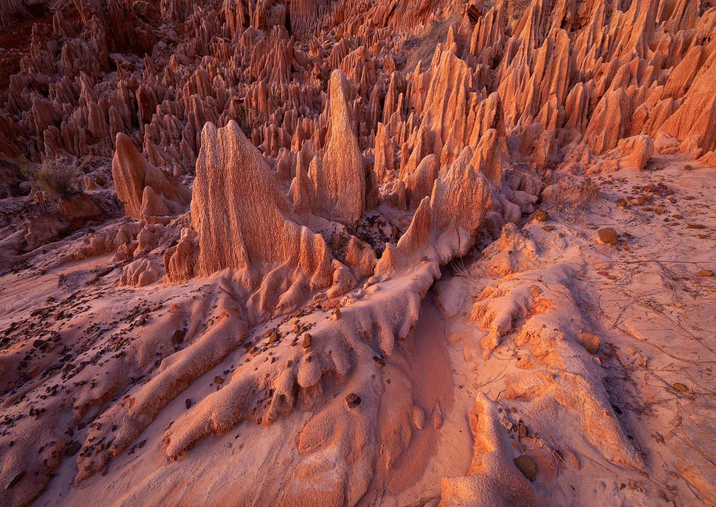 Red Wasteland Layered Red Tsingy Speads Across A Mountain Slope At