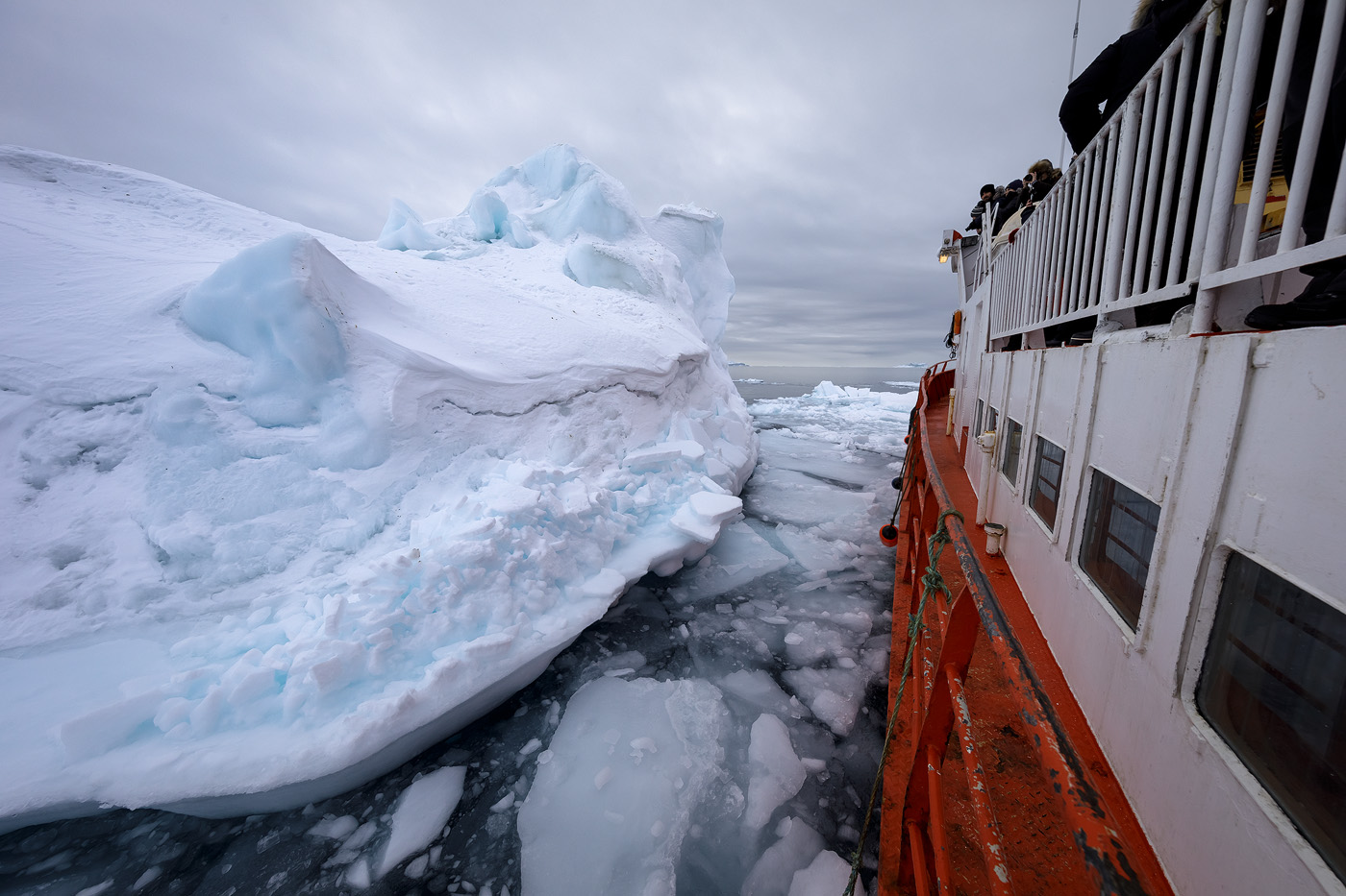 Tourists enjoying the icebergs right outside town