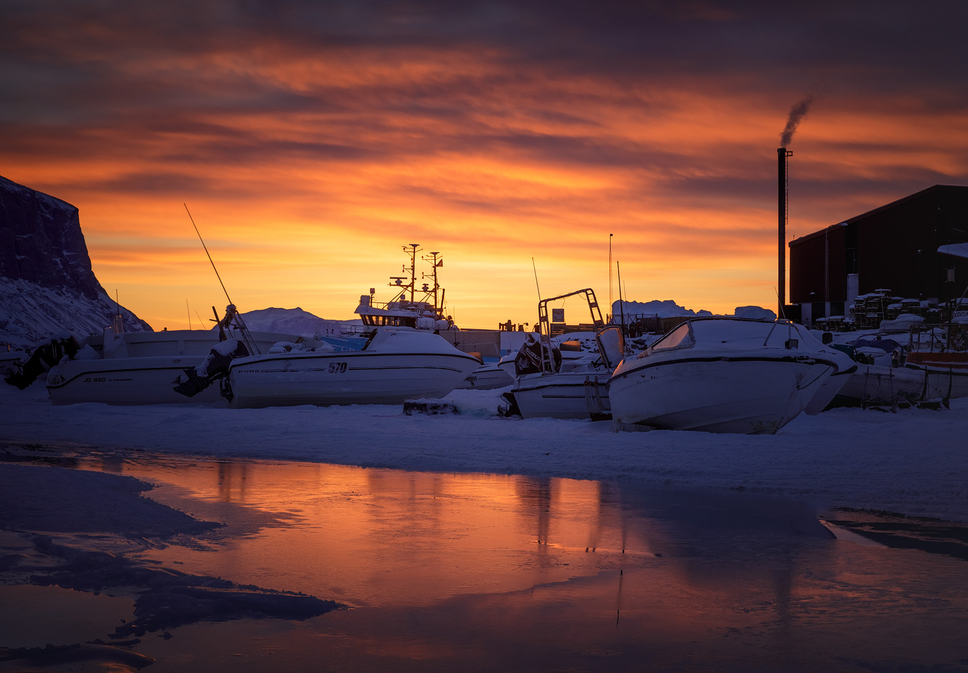 Uummannaq harbor by sunrise